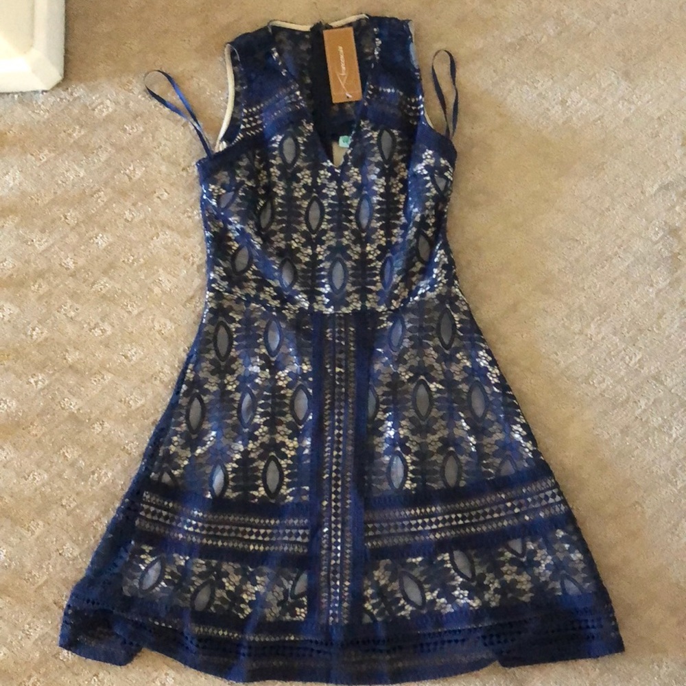 Francesca’s navy lace dress